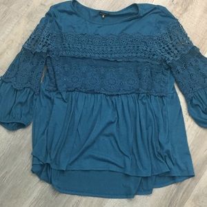 Dark teal top with crochet details